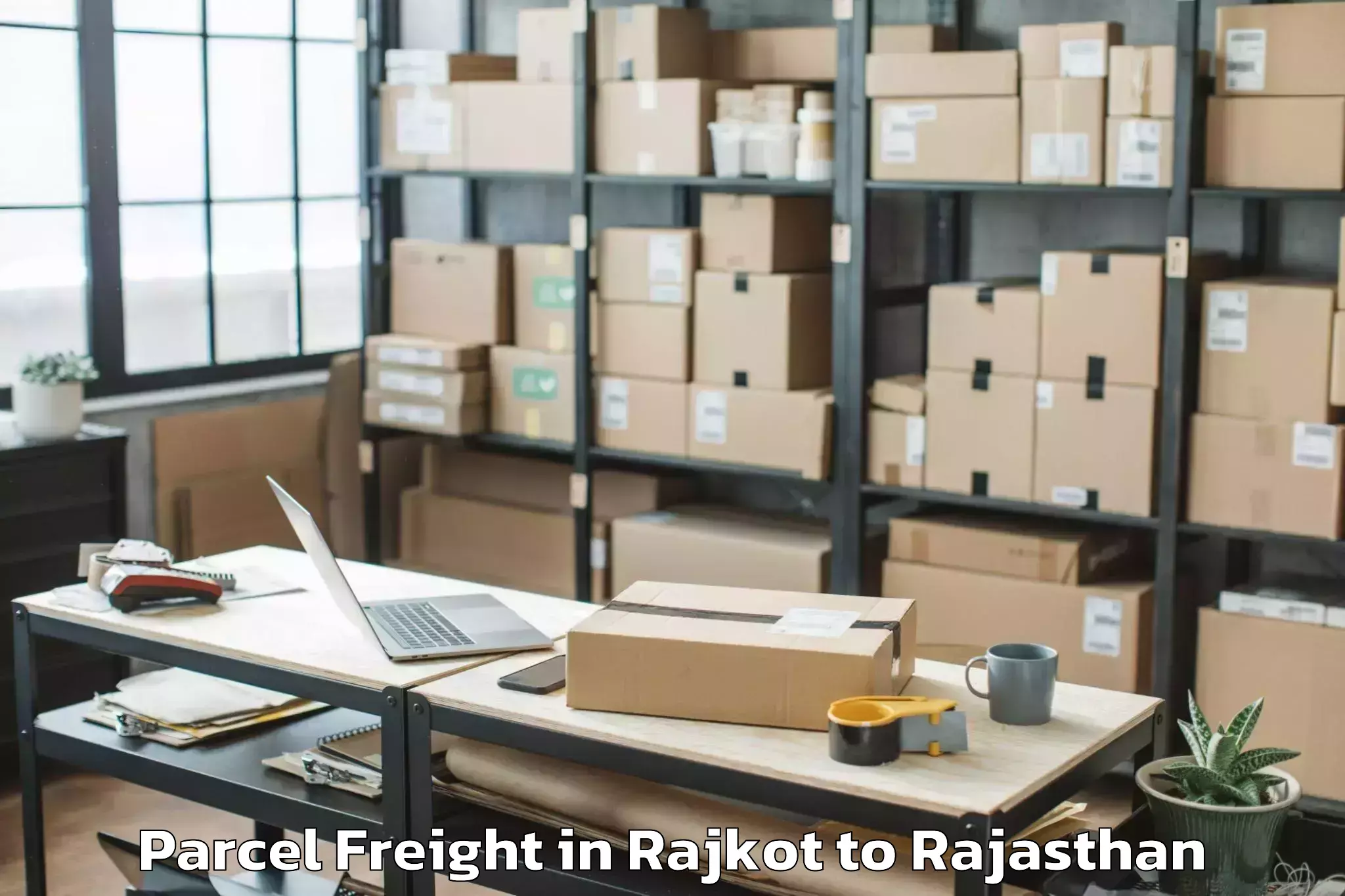 Easy Rajkot to Jagannath University Jaipur Parcel Freight Booking